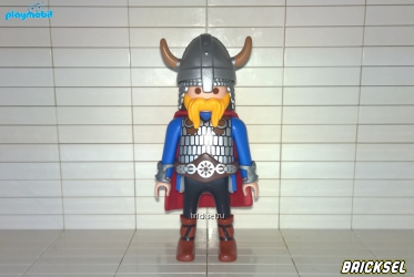 Викинг в рогатом шлеме и с рыжей бородой