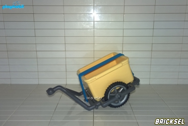 Велоприцеп со светло-желтым ящиком