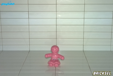 Кукла сидячая розовая