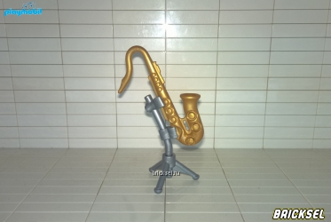 Саксофон на подставке золотой