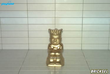 Золотая статуэтка божества