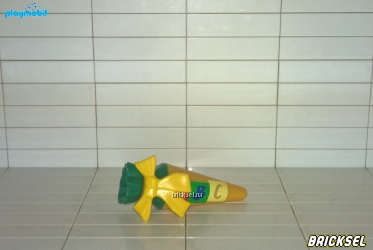Сверток-подарок зеленый верх низ с буквами ABC перевязан желтым бантом желтый
